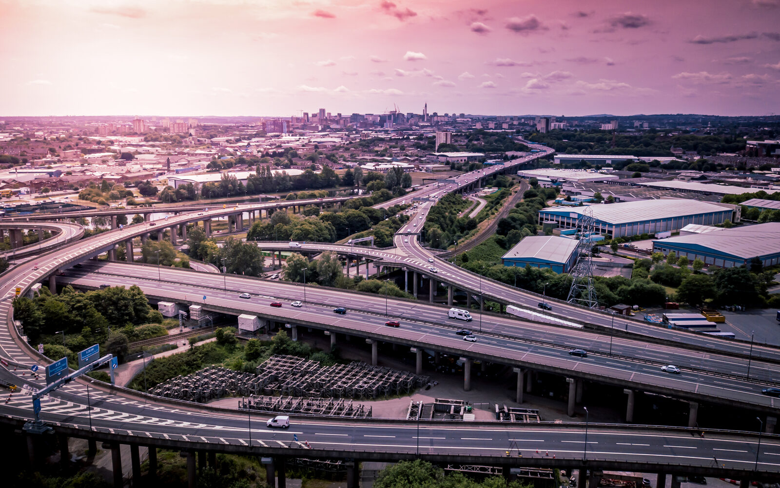 Aerial view of motorway junction and surrounding landscape